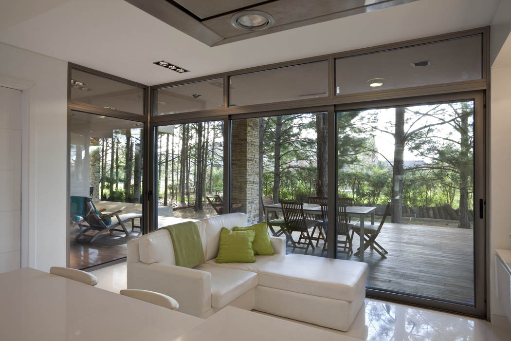 a living room with a large glass door