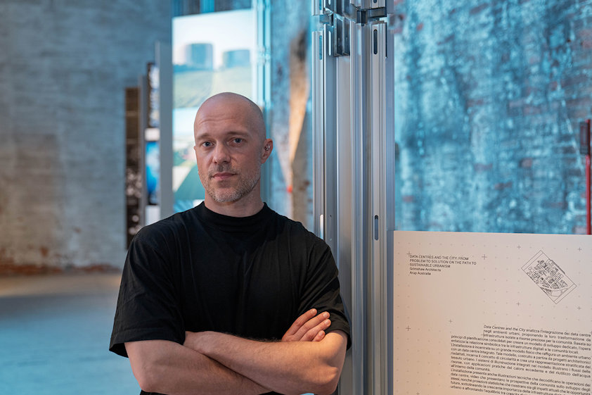 a man sitting in a doorway