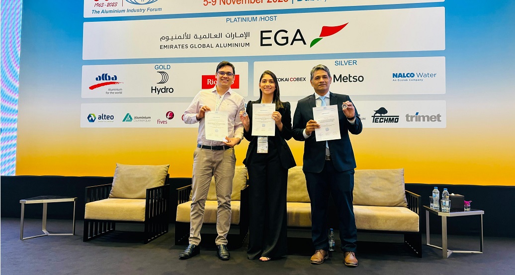 a group of people holding certificates