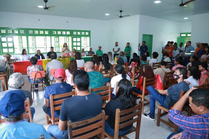a group of people sitting in a room